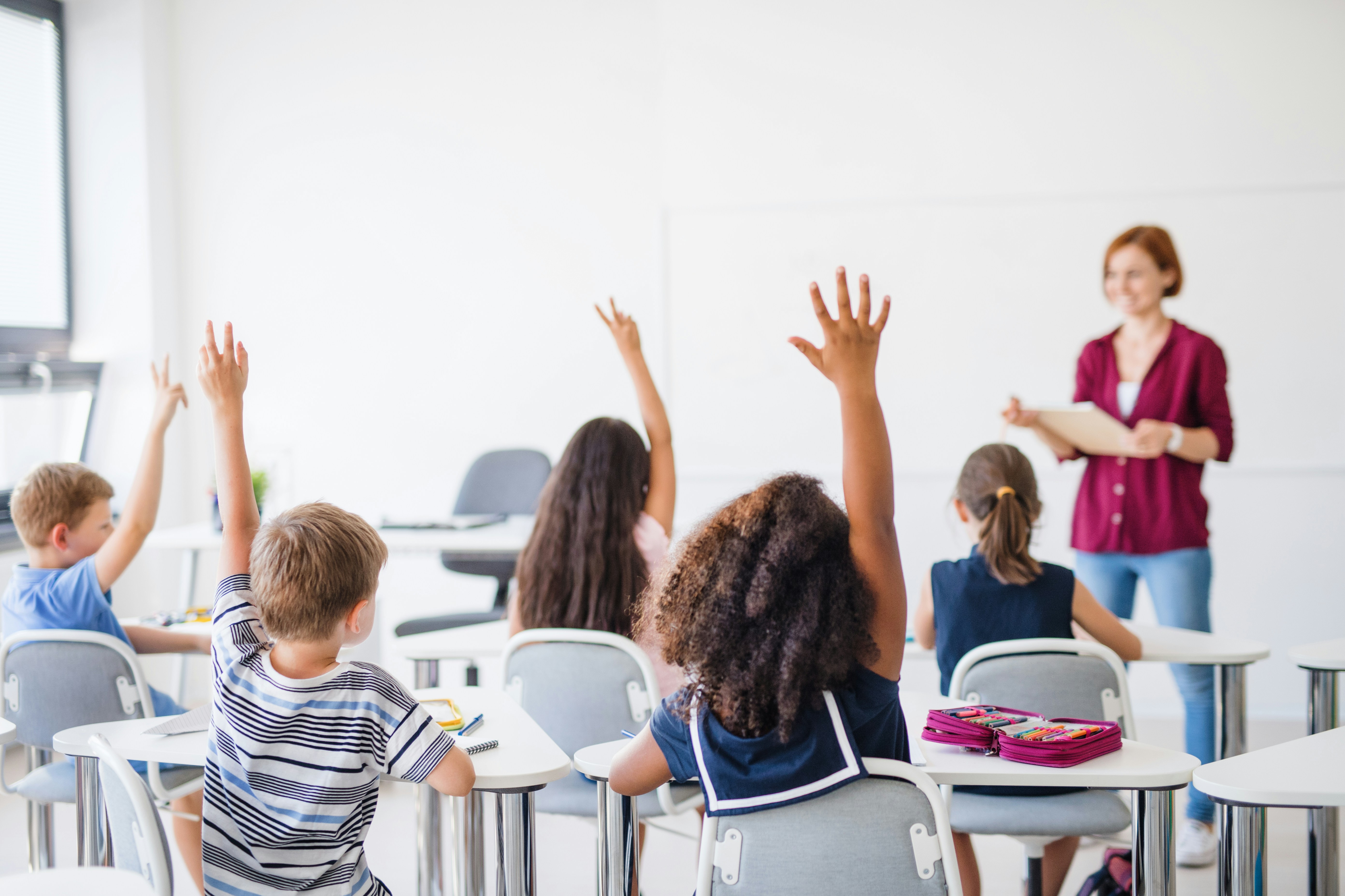 Children in a workshop. 11+.